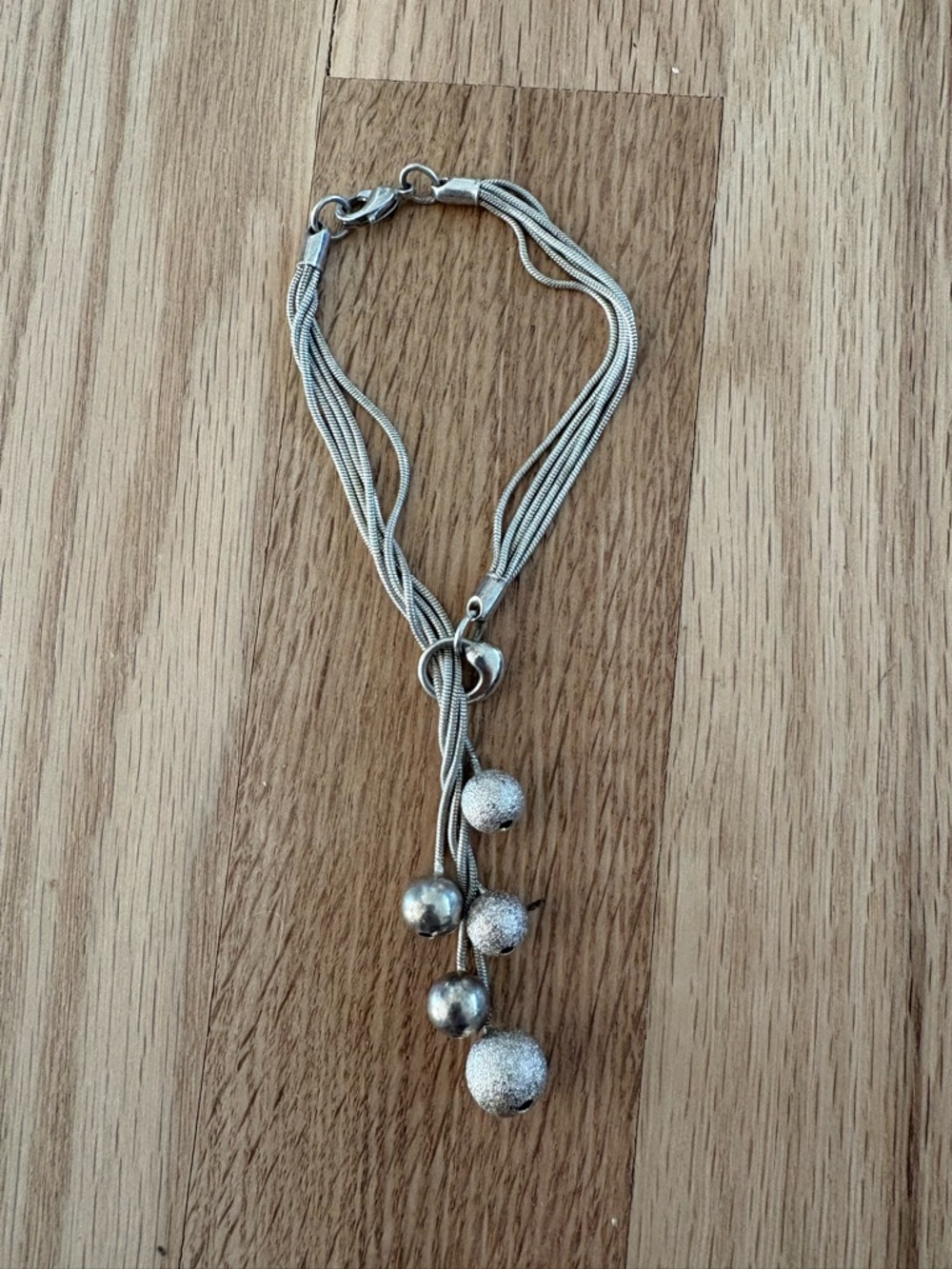 Silver Multi-Strand unique bracelet with Textured Beads